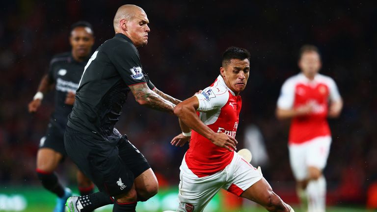 Alexis Sanchez is closed down by Liverpool's Martin Skrtel