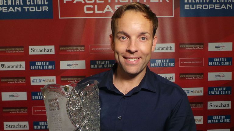 Ali Carter gets his hands on the Paul Hunter Classic trophy after an emotional year
