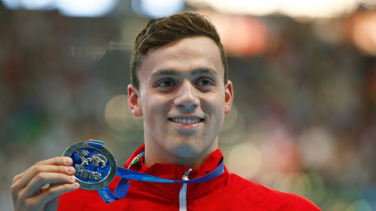 James Guy shows off his silver medal in Kazan