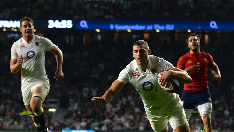 England wing Jonny May scores his side's third try of the game