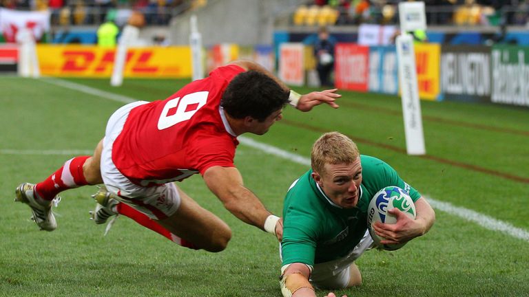 Keith Earls beats Mike Phillips to score a try during Ireland's World Cup quarter-final loss to Wales in 2011