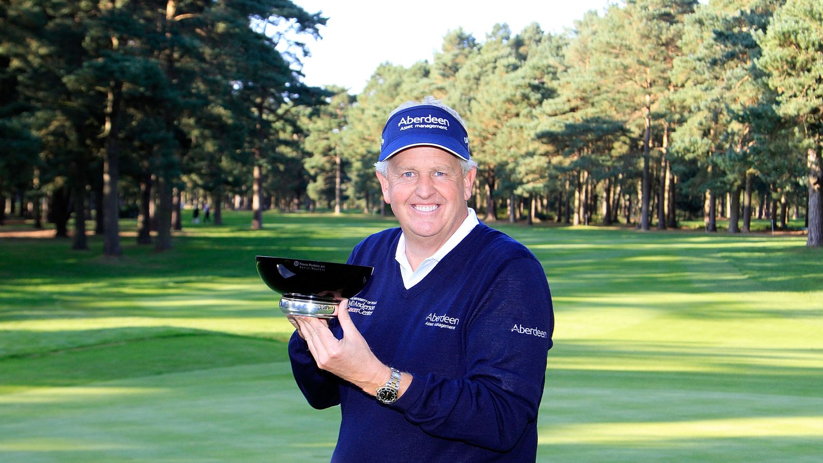 Colin Montgomerie wins record third straight title at Travis Perkins