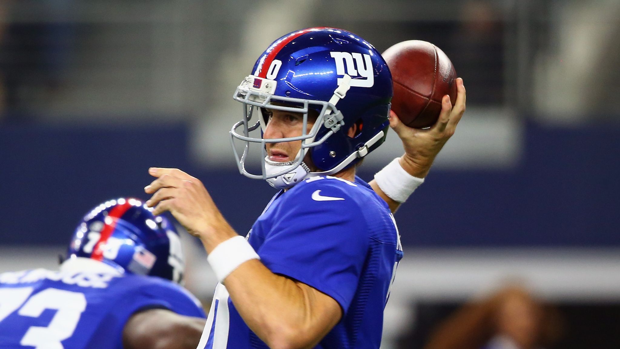 New York Giants quarterback Eli Manning releases a pass in the