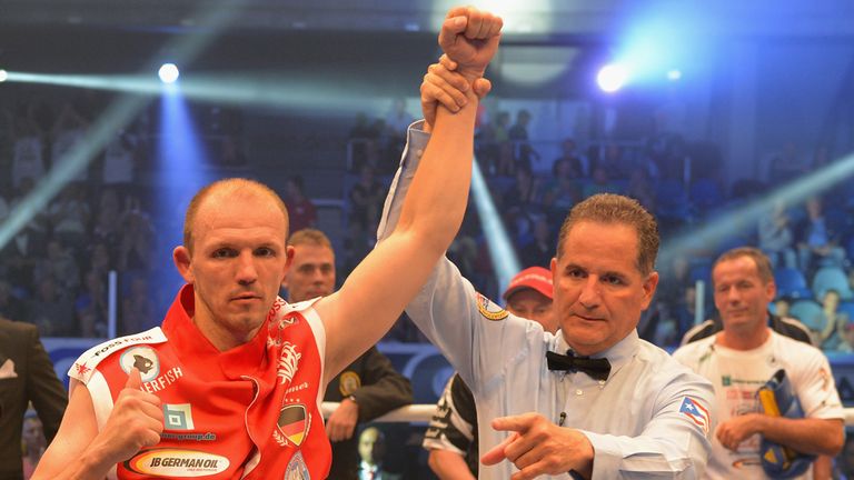 Juergen Braehmer celebrates his victory over Konni Konrad