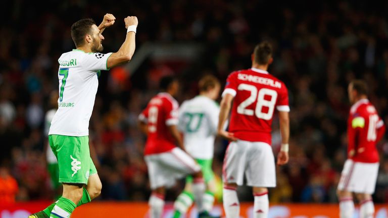 Caligiuri celebrates his opener at Old Trafford