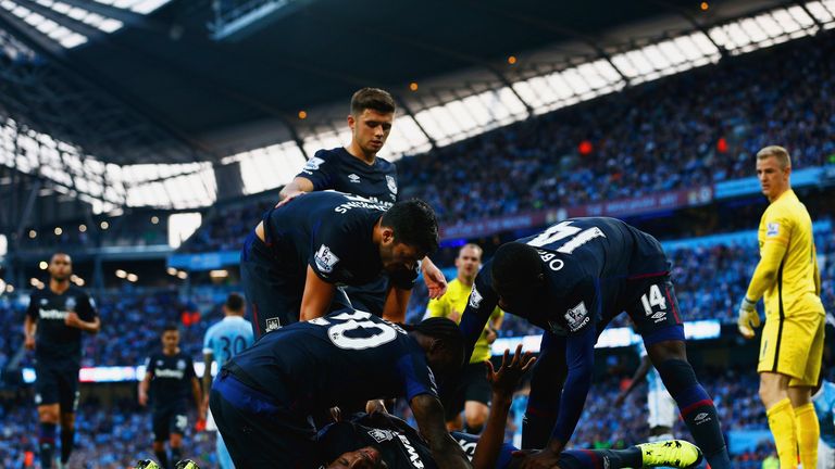 Diafra Sakho is mobbed after scoring his team's second goal