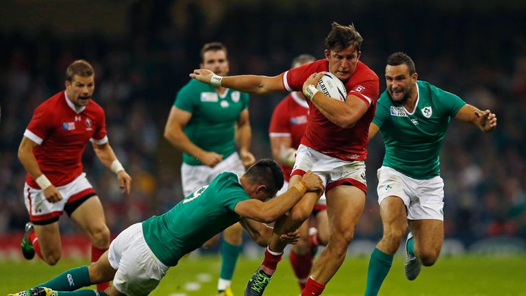 DTH Van Der Merwe of Canada is tackled by Conor Murray of Ireland during the 2015 Rugby World Cup Pool D match