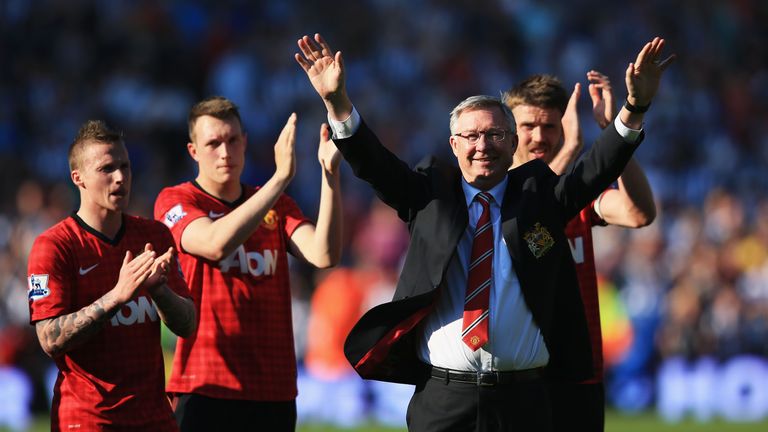 Sir Alex Ferguson is applauded by players after his 1,500th and final match in charge of Man Utd
