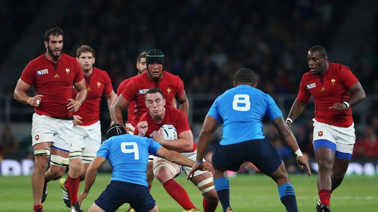 Louis Picamoles of France is tackled by Edoardo Gori of Italy during the Rugby World Cup Pool D clash at Twickenham