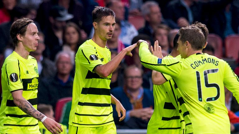 Celtic's Mikael Lustig celebrates his goal with his team-mates