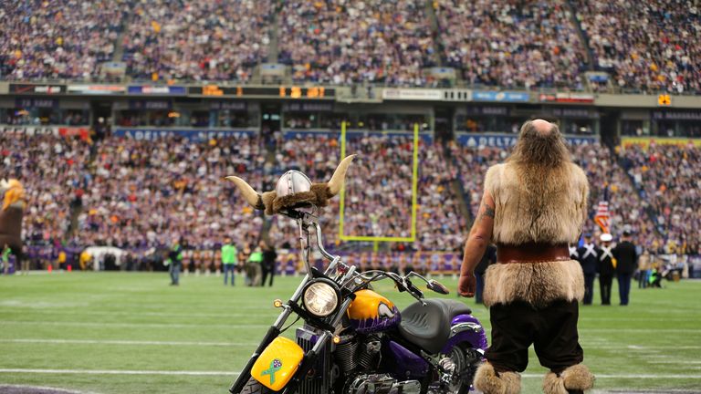 Minnesota Vikings mascot Ragnar rides a motorcycle onto the field before  the NFL football game against the Chicago Bears won by the Vikings 36-10,  Sunday, Nov. 29, 2009 in Minneapolis.(AP Photo/Andy King