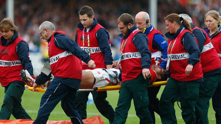 Mafi leaves the field on a stretcher after suffering a neck injury