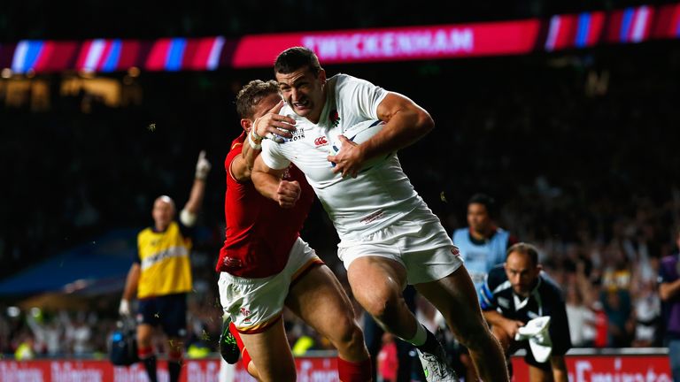 Jonny May runs in to score for England