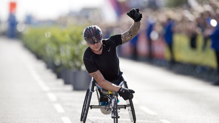 David Weir celebrates his victory in the Great North Run