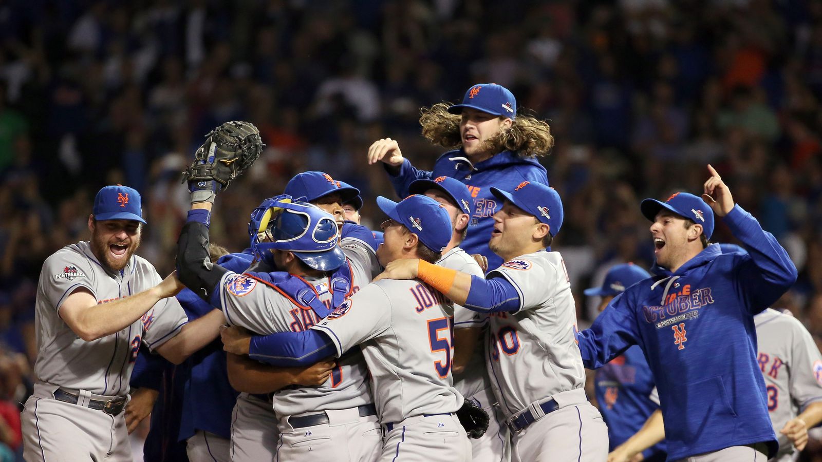 Daniel Murphy sets postseason homer record as Mets advance to World Series.