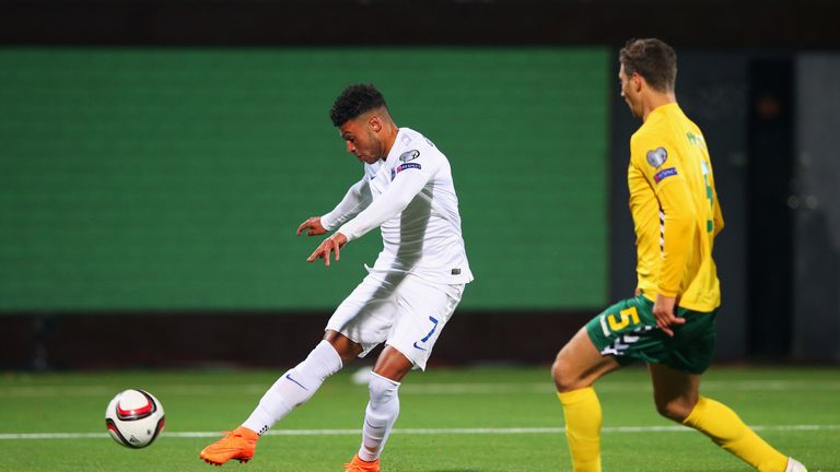 Alex Oxlade-Chamberlain (left) scored England's third with a powerful effort