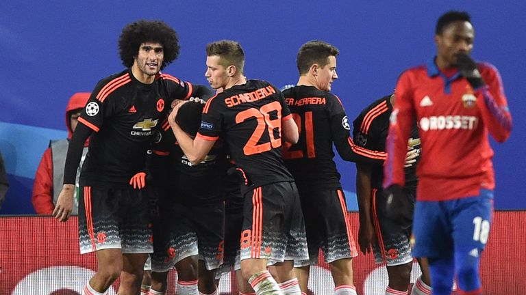 Martial is mobbed after scoring Manchester United's equaliser