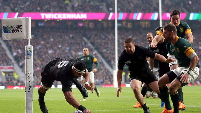 Jerome Kaino scores for New Zealand in the semi-final against South Africa