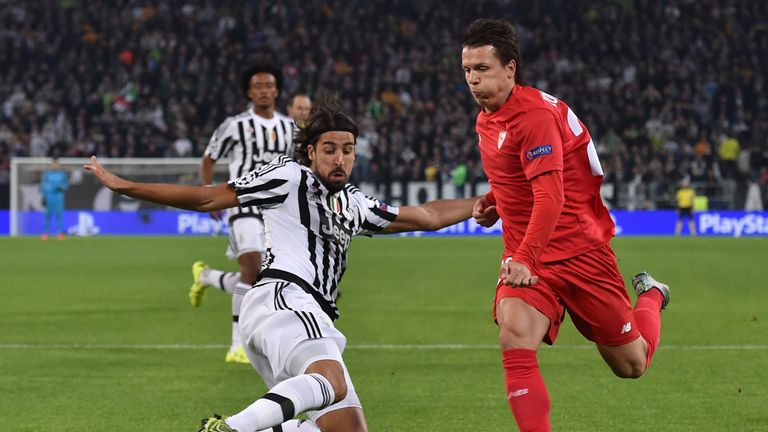 Yevhen Konoplyanka (right) of Sevilla causes havoc in the Juventus defence in the Champions League