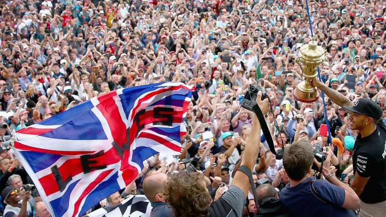 The home favourite: Lewis Hamilton celebrates winning the British GP with the Silverstone crowd - Picture by Clive Mason, Getty Images