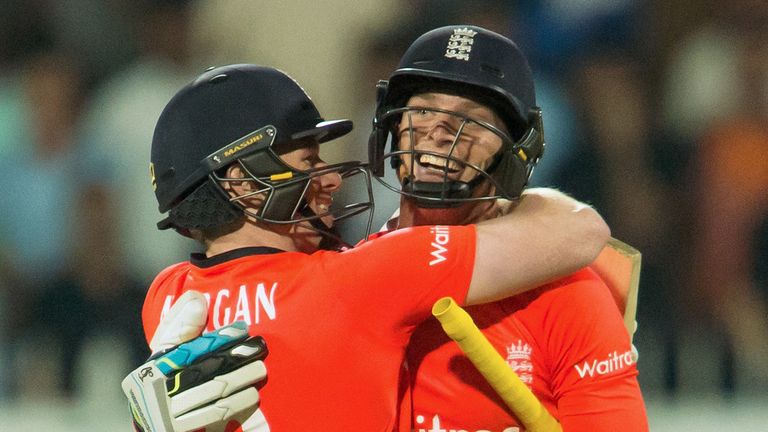 England's captain Eoin Morgan and Jos Buttler celebrate victory