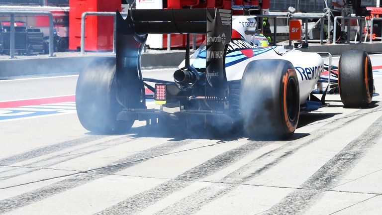 Laying rubber: Williams' Felipe Massa smokes his tyres during practice for the Malaysia GP - Picture by Mark Sutton, Sutton Images