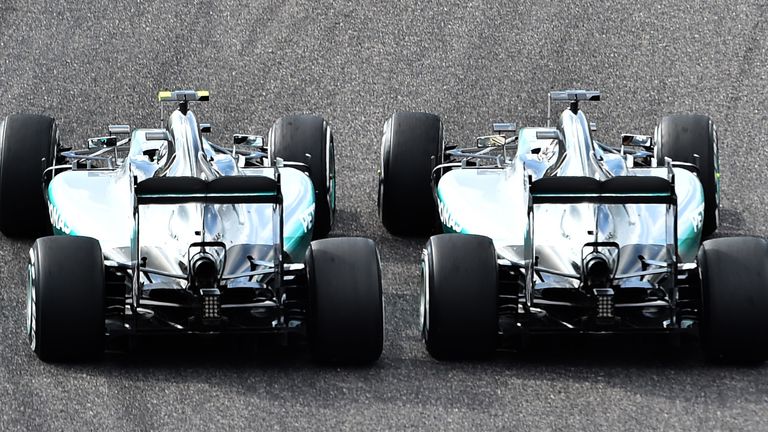 Getting ahead: Lewis Hamilton out-muscles Nico Rosberg on the opening lap of the Japanese GP - Picture by Keith Sutton, Sutton Images