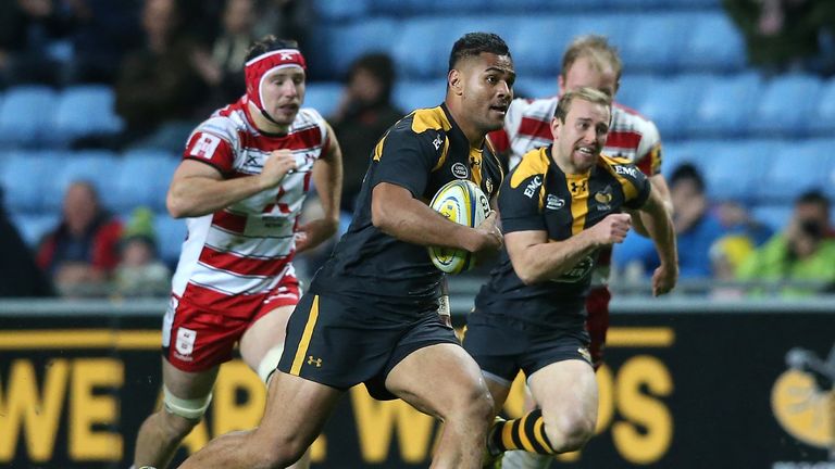  Frank Halai of Wasps breaks with the ball