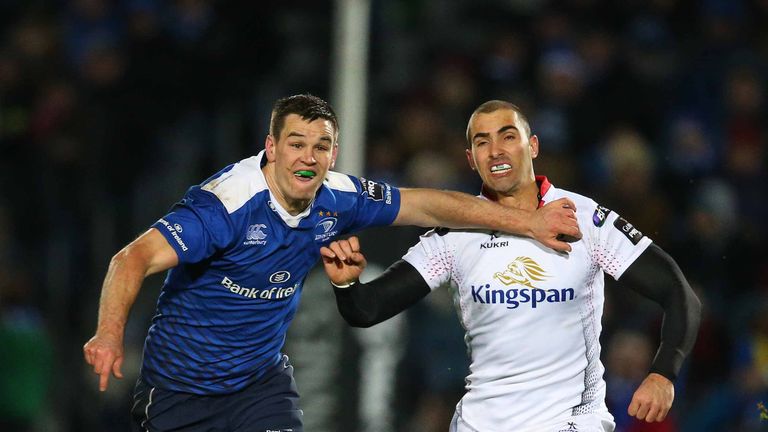 Leinster's Jonathan Sexton (L) and Ulster's Ruan Pienaar battle against each other