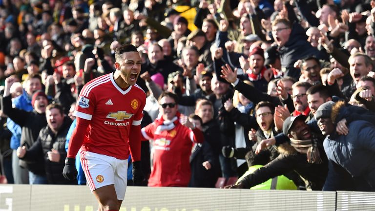 Man Utd's Memphis Depay celebrates scoring the opening goal against Watford