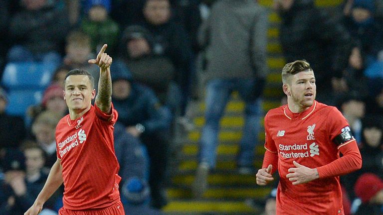 Philippe Coutinho celebrates after putting Liverpool two up