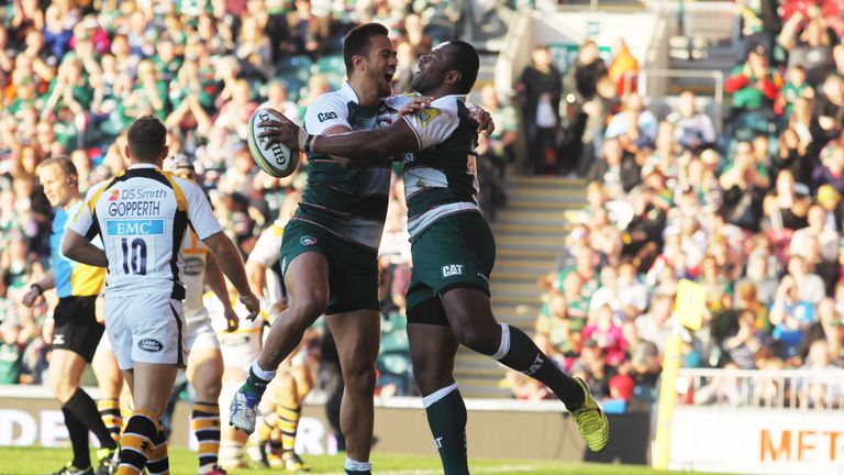 Leicester centre Vereniki Goneva (right) celebrates his try with Peter Betham