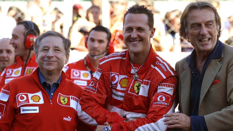 Schumacher with Todt (left) and Ferrari president Luca di Montezemolo (right) at the 2006 Italian GP