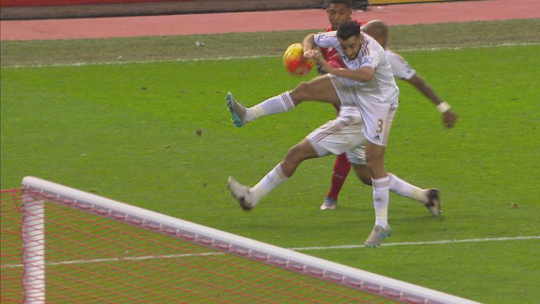 A penalty is awarded for a handball from Neil Taylor from a Jordon Ibe cross in Liverpool's win over Swansea