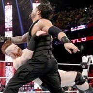 Roman Reigns clatters Sheamus during TLC's main event