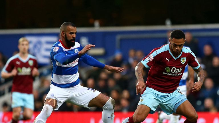 Andre Gray keeps the ball away from Sandro as the game ended goalless