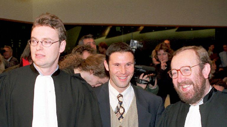 Jean-Marc Bosman (centre) flanked by two of his lawyers Luc Misson (right) and Jean-Louis Dupont (left) after the ruling was passed in 1995