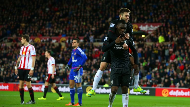 Christian Benteke celebrates his goal with Adam Lallana