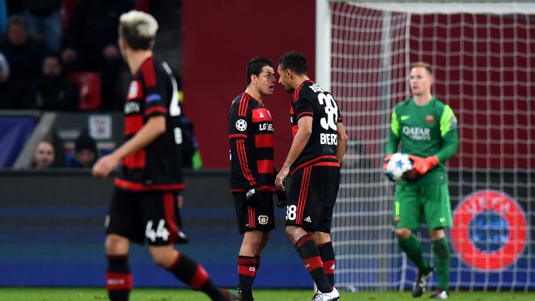 Javier Hernandez (l) and Karim Bellarabi argue