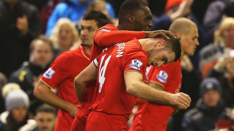 Jordan Henderson is congratulated by Christian Benteke after putting Liverpool in front