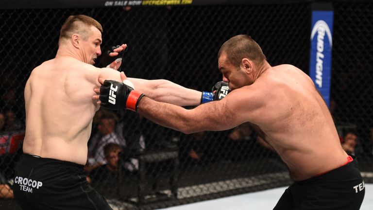 Mirko Cro Cop (left) punches Gabriel Gonzaga