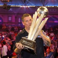 Gary Anderson celebrates with the Sid Waddell Trophy