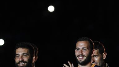 Image of Barcelona's Turkish midfielder Arda Turan (left) and defender Aleix Vidal (right) 