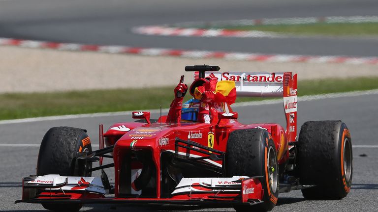 Ferrari's Fernando Alonso from Spain, right, drives his car in between the  pack during the European Formula One Grand Prix at Valencia street circuit,  Spain, Sunday, June 24, 2012. The race takes