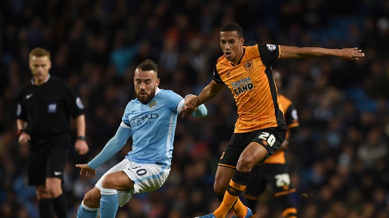 Hull City want to sign on-loan Arsenal defender Issac Hayden (right) on a permanent deal