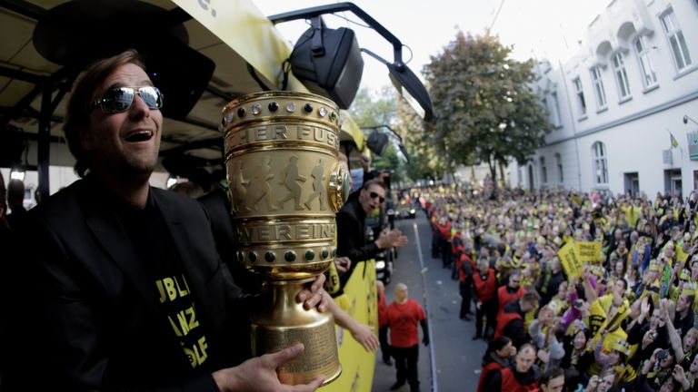 Klopp on the Dortmund bus with the DFB Pokal Cup after their 2012 double
