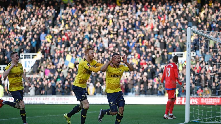 Roofe (second right) was a prolific scorer for Oxford in Sky Bet League Two last season