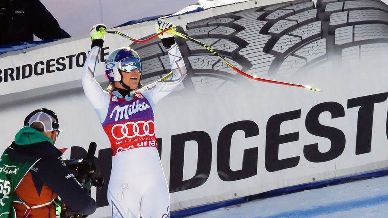 Lindsey Vonn celebrates her record-breaking downhill victory at Cortina