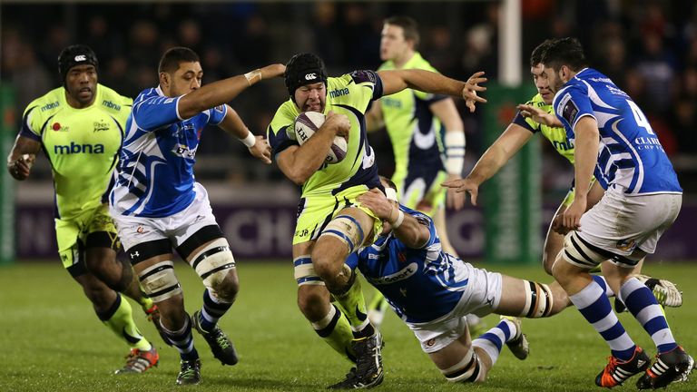 Beaumont is closed down by Taulupe Faletau (left),  Landman (centre) and  Cory Hill (right)