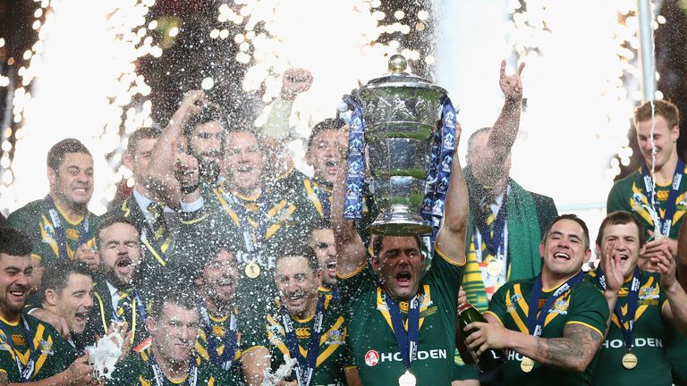 Australia captain Cameron Smith lifts the winners trophy after his sides 34-2 victory in the World Cup final